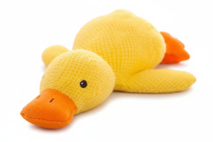 Yellow duck plush toy on a white background